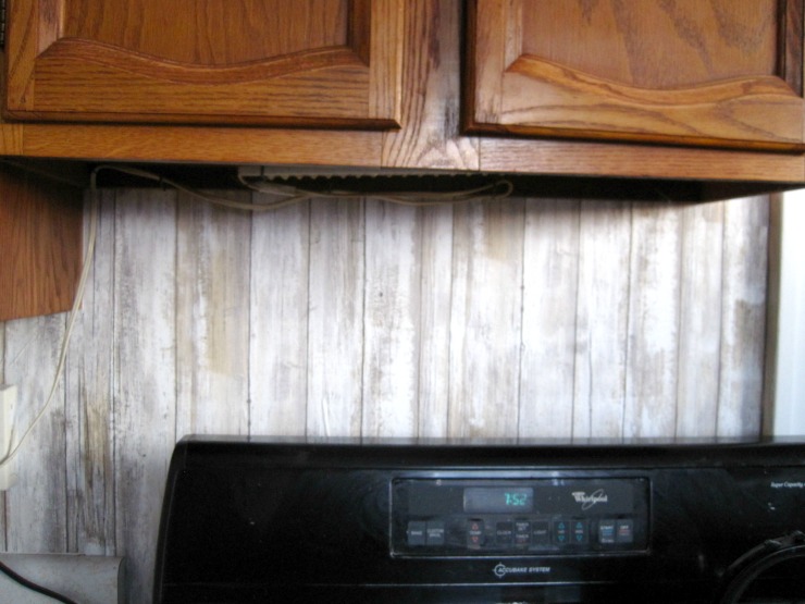 Close up on the wallpaper kitchen back splash-- the pattern is very forgiving, so bumps and mistakes are very hard to notice kitchen backsplash options a wall paper back splash that has a rustic look